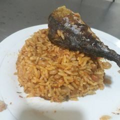 A picture of Rice and beans with titus fish.