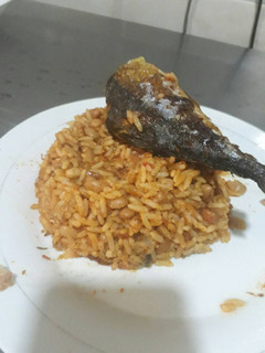 A picture of Rice and beans with titus fish.