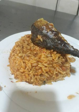 A picture of Rice and beans with titus fish.