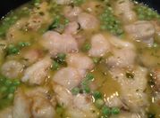 Una foto de cocochas en salsa verde