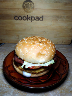 A picture of Double patty burger with Hung curd sauce.