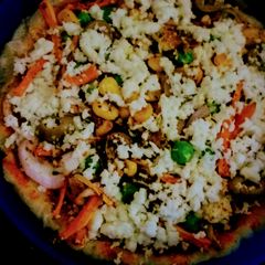 A picture of Veg Pizza made with homemade base.