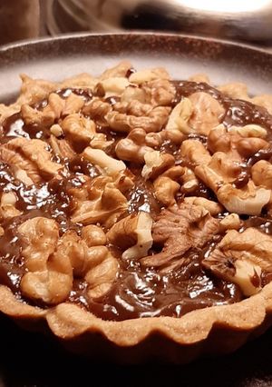 Una foto de Tarteleta de dulce de leche y nuez 🥧