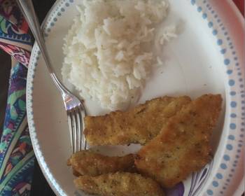 Fast Cooking Methods Breaded fish with rice and cauliflower Restaurant Style