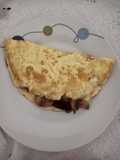 Omelette de champiñones