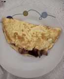 Omelette de champiñones