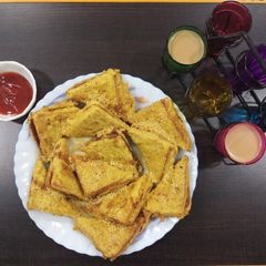 A picture of Cutting chai & bread pakoda with left over sabji.