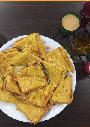 A picture of Cutting chai & bread pakoda with left over sabji.