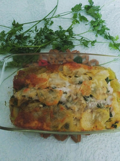 Una foto de Rosada al horno con patatas