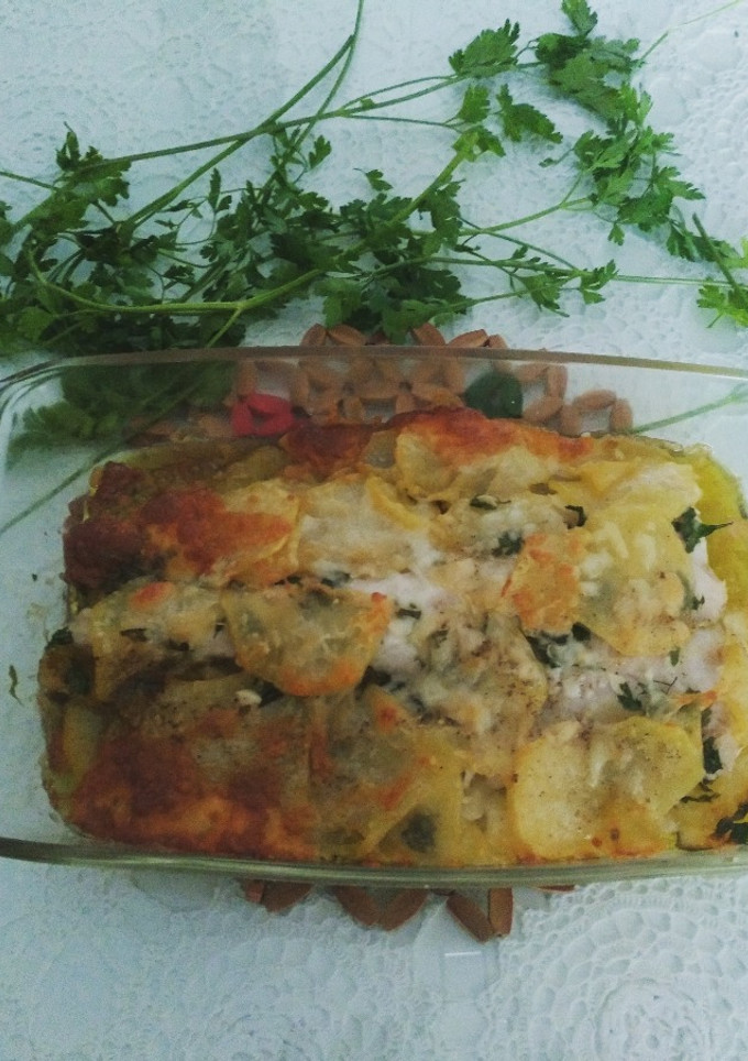 Una foto de Rosada al horno con patatas
