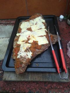 Una foto de Matambrito a la pizza