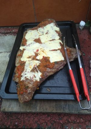 Una foto de Matambrito a la pizza