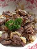 Carne encebollada