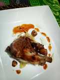 Roasted lamb rack with red wine reduc. And cream cheese melt
