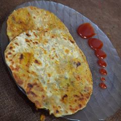 A picture of Onion and tomatoes paratha.
