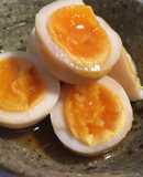Soft boiled eggs marinated in soy sauce and mirin