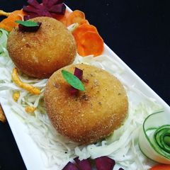 A picture of Spicy Chicken Tikka Pizza Bomb.
