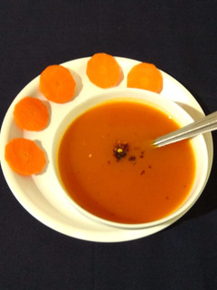 A picture of Carrot tomato soup.