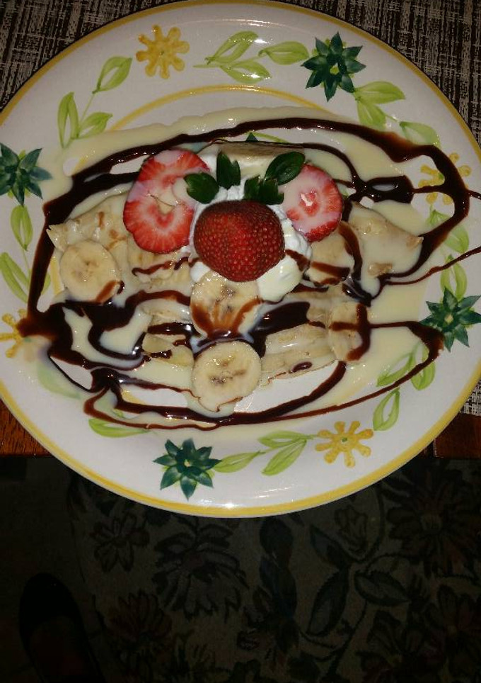 Una foto de Crepas rellenas de plátano y fresa