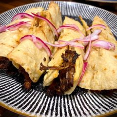 A picture of Taquitos Machaca.