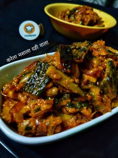 करेला मसाला दही वाला (karela masala dahi wali recipe in Hindi) रेसिपी मुख्य फोटो