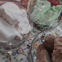 A picture of 3 flavoured ice-cream.
