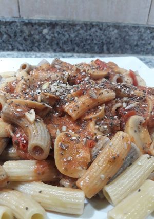 Una foto de Salsa de tomate y champignones