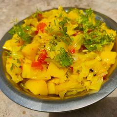 Cabbage potatoes and green chillies nu rasilu shak A picture of Cabbage potatoes and green chillies nu rasilu shak.