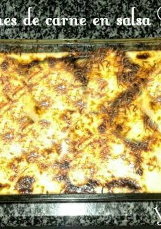 Una foto de Canelones de carne mixta y boloñesa