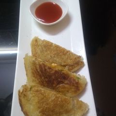 A picture of Potato Tawa Toast.