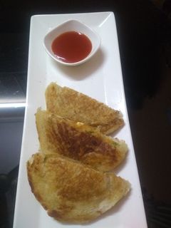 A picture of Potato Tawa Toast.