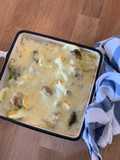 Romanescu con bechamel, queso y pesto