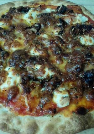 Una foto de Pizza de queso philadelphia