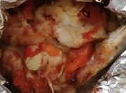 Una foto de reineta al horno con queso