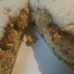 A picture of Fried Egg and Salmon Sandwich.