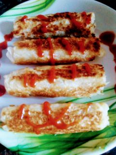A picture of Bread paneer rolls.
