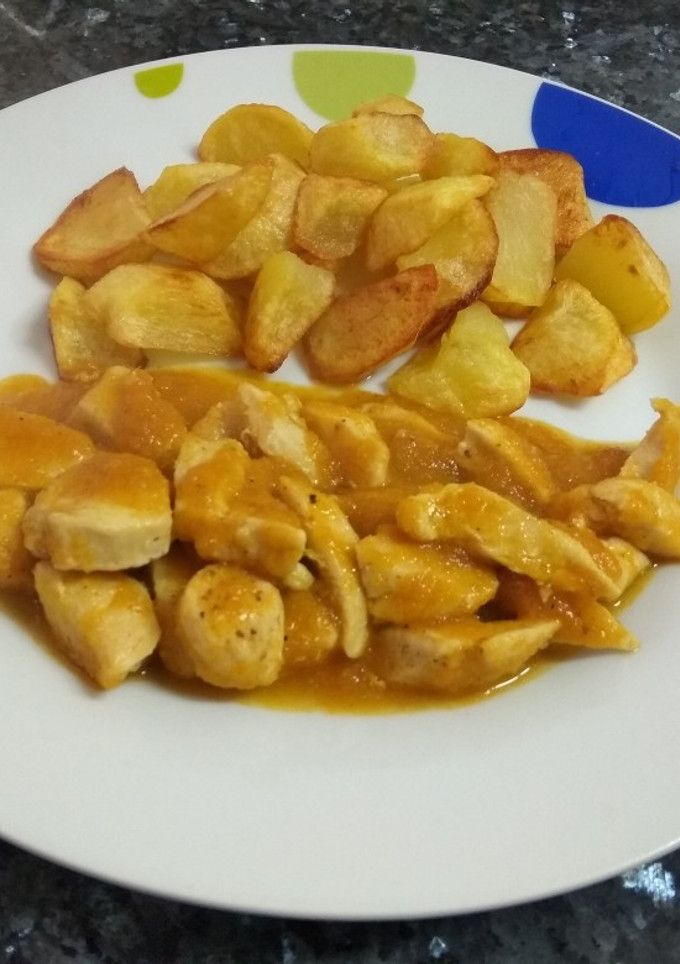 Una foto de Pollo con salsa de zanahoria al curry