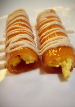 Una foto de Canutillos de membrillo con crema de vainilla