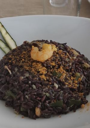 Foto di Riso venere con gamberetti, zucchine e bottarga