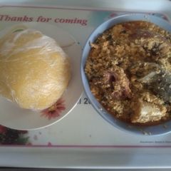 A picture of Egusi soup and EBA for Lunch.
