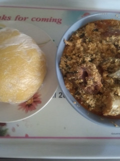 A picture of Egusi soup and EBA for Lunch.