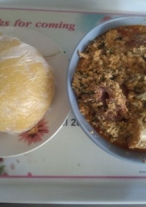 A picture of Egusi soup and EBA for Lunch.