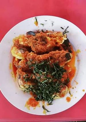 A picture of Roasted bole, yam and fish.