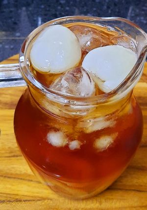 Hình của món Vải ngâm đường phèn ‐ trà vải.