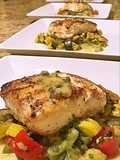 Wild halibut with lemon honey butter caper sauce and succotash