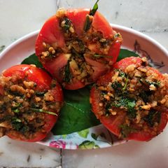 A picture of Stuffed tomatoes.