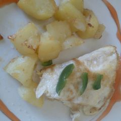 A picture of Egg and potatoes breakfast.