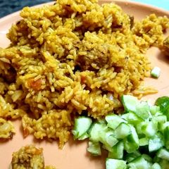 A picture of Mutton biryani in pressure cooker.