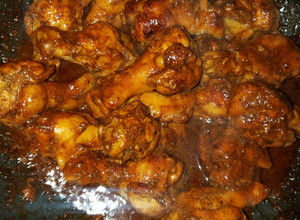 Una foto de Alitas de pollo agridulces.
