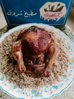صورة لوصفة فراخ مشويه ومحشية بخلطة رز شرقي